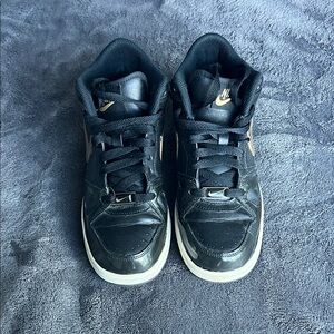 Nike Black Sneakers with Gold Details